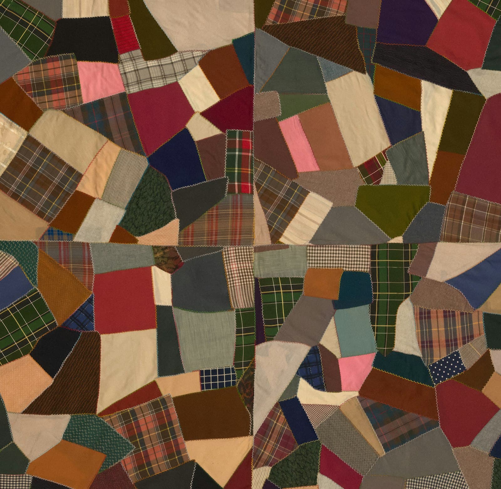 Multicolor patchwork quilt with many pieced patterns